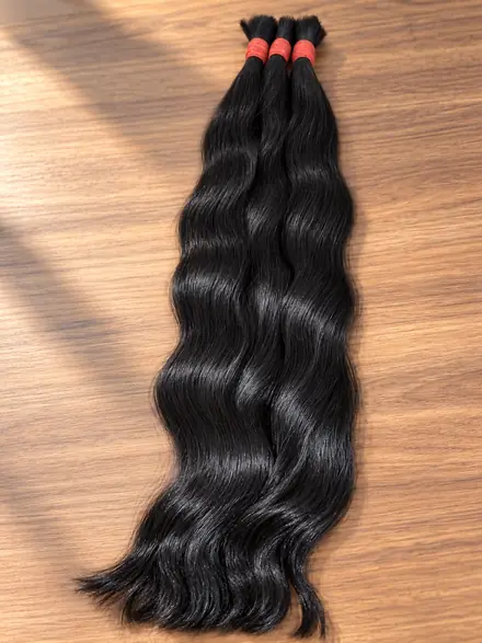 Cabelo humano preto ondulado